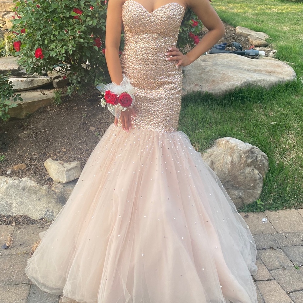 A Moro Lee strapless prom dress.
